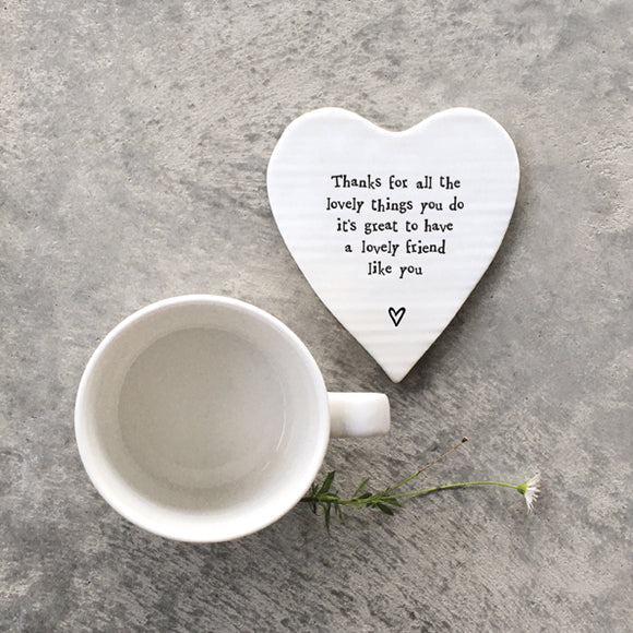 East of India Porcelain Coaster Heart shaped coaster with the words; 'Thanks for all the lovely things you do its great to have a lovely friend like you'.