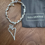 Eliza Gracious - Stretch square bead bracelet with heart charm | Pale Gold