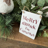 Christmas Mini Metal Hanging Sign 9cm - Off white sign with deep red distorted lettering;
Quote - Merry drunk I'm Chistmas