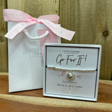 Life Charms the Thoughtful Jewellery Co. Just Because Bracelet Collection; Go For It! World is your oyster x Pure silver plated with cute hanging oyster shell charm that opens to reveal a pearl inside, presented on a 5mm beaded stretch bracelet.