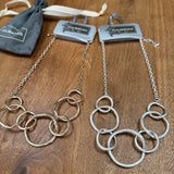 Eliza Gracious quality affordable design led branded costume jewellery
Short chain Necklace with beaten effect Circles linked together 
Available in Burnished Matt Silver & Pale Gold EN1016