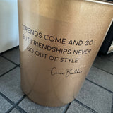 Soy Candle 12.5cm 
Presented in a Gold Glass Jar with the Fragrance Silky Tonka
Quote by Inspirators collection - Carrie Bradshaw;
'Trends come and go, but friendships never go out of style' 