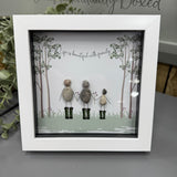 Pebble Art by La De Da Living 
Award winning keepsake gifts - Handmade in the Cotswolds 
Framed Pebble Art - Midi White block square frame 17.5cm
Quote - Life is beautiful with family'
Image - Family of 3 wearing wellies walking together with trees..