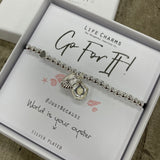 Life Charms the Thoughtful Jewellery Co. Just Because Bracelet Collection; Go For It! World is your oyster x Pure silver plated with cute hanging oyster shell charm that opens to reveal a pearl inside, presented on a 5mm beaded stretch bracelet.