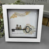 Pebble Art by La De Da Living 
Award winning keepsake gifts - Handmade in the Cotswolds 
Framed Pebble Art - Midi White block square frame 17.5cm
'Home Sweet Home - There's no place like home'