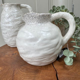 Off-white Speckled Rim Round Beba Jug
Available in 2 sizes - Small 9.5cm &  Large 18.5cm