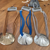 Eliza Gracious quality affordable design led branded costume jewellery
Short 6 suede coloured strand Necklace with a beaten effect mis-shaped pendant  
Available in 3 colours - Cobalt blue on Matt Silver, Pale Grey on Matt Silver & Light tan on Pale Gold EN0990