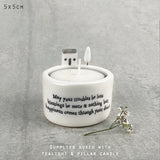 East of India Perfect Gifts with a meaningful quotes;  Small round T-LIght holder 5x5cm with a decorative top with a house & tree   'May your troubles be less  blessings be more & nothing but happiness comes through your door'  5731