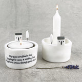 East of India Perfect Gifts with a meaningful quotes;  Small round T-LIght holder 5x5cm with a decorative top with a house & tree   'May your troubles be less  blessings be more & nothing but happiness comes through your door'  5731