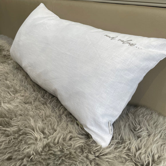 Chalk - Oblong 100% linen 35x70cm Cushion with feather pad Colour - White  Embroidered Quote - 'and relax...' in the top right corner