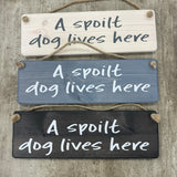 Wooden Hanging Sign - "A spoilt dog lives here"