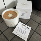 Soy Candle 6.5cm with a Wish-bracelet
Presented in a White Glass Jar with the Fragrance Fresh Cotton
Quote on the Candle Jar -  'You are a Star'