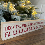Wooden hanging / standing long Christmas Sign L40cm fun sign decorated in red glitter text; 
'Deck the Halls and not your Family Fa La La La La La La La La' 