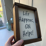 Made in the UK by Giggle Gift co.
Small Rectangular H24cm Framed Plaque with Old White vinyl & grey text
"Life Happens, Gin Helps!"