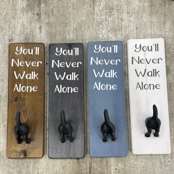Made in the UK by Giggle Gift Co Wooden L29.5cm Hanging Quotable Frame with a dog tail metal hook; 'You'll Never Walk Alone'