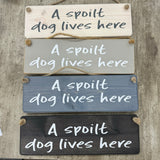 Wooden Hanging Sign - "A spoilt dog lives here"