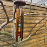 Woodstock Windchime 17" CHAKRA CHIMES BRONZE - Seven Stones (CC7BR)
The seven stones of this wind chime's clapper are aligned in an ascending column, just as the seven chakras are aligned along the spine of the human body.