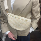 Raffia Sling Cross body Bag with gold fixtures and plain cream strap
Colour - Cream