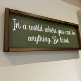 Made in the UK by Giggle Gift Co
Rectangular L63.5cm Framed quotable Plaque in olive green vinyl;
"In a world where you can be anything, Be kind."