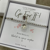 Life Charms the Thoughtful Jewellery Co. Just Because Bracelet Collection; Go For It! World is your oyster x Pure silver plated with cute hanging oyster shell charm that opens to reveal a pearl inside, presented on a 5mm beaded stretch bracelet.