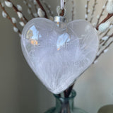 Heart shaped Glass Bauble 10cm filled with feathers with the quote;  Feathers appear when angels are near