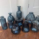 Collection of Blue small glass vases in various sizes and shapes - mix and match to make a colourful display