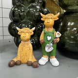 Standing Harry the Highland Cow with Shovel