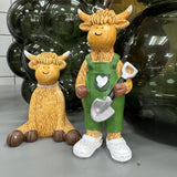 Standing Harry the Highland Cow with Shovel