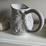 Small H15cm distressed neutral Jug with acorn & leaves design