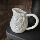 Small H15cm distressed neutral Jug with acorn & leaves design