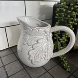 Small H15cm distressed neutral Jug with acorn & leaves design