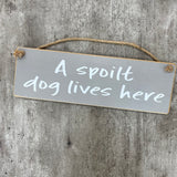 Wooden Hanging Sign - "A spoilt dog lives here"