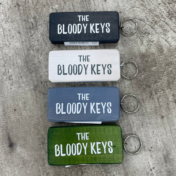 Made in the UK by Giggle Gift Co. Wooden block keyring with white text quote on both sides; 'The Bloody Keys'  One of the Best Sellers!!