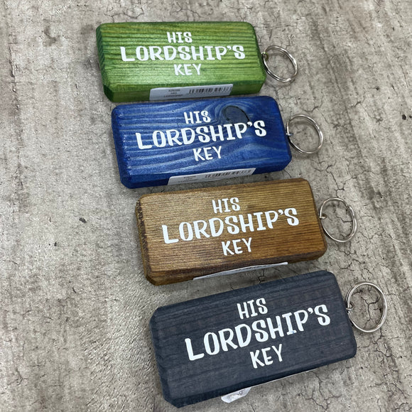Made in the UK by Giggle Gift Co. Wooden block keyring with white text quote on both sides; 'His Lordship's Key' 