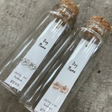 Attic Creations - giftings life's precious moments since 2010;    Message in a Bottle Sterling Silver Earrings handmade in Devon Style - Silver & Rose Gold paw print shaped earrings  Quote on the card - 'Dog Mama'