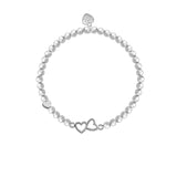 Silver beaded elastic bracelet with 2 hearts together charm