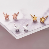 Sweet star shaped stud earrings presented in a message bottle on a card that reads "You're a star"  Sterling silver