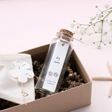 Attic Creations - giftings life's precious moments since 2010;    Message in a Bottle Sterling Silver Earrings handmade in Devon Style - Silver & Rose Gold paw print shaped earrings  Quote on the card - 'Dog Mama' BT039