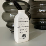 White Ceramic Mini Bud Vase 9cm with quote; 'Families are like branches on a tree, they grow in different directions yet our roots remain as one'