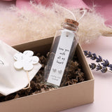 Attic Creations - giftings life's precious moments since 2010;    Message in a Bottle Sterling Silver Earrings handmade in Devon Style - Silver heart shaped stud earrings Quote on the card - 'Love you with all my Heart'
