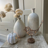 A gorgeous caged antique brown/copper Robin wrapped in 20 warm white LEDs, stood on a round block. Stunning accessory for the home that transforms from day to night, looks great displayed on a shelf or windowsill.