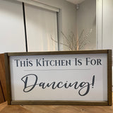 Made in the UK by Giggle Gift Co Rectangular L63.5cm Framed Plaque with white vinyl; "This Kitchen is for dancing!"