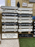 Long Wooden Hanging Sign - 'In This Kitchen, We Lick The Spoon!'