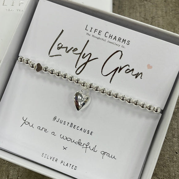 Life Charms Sivler Bracelet with puffed silver heart charm reads 