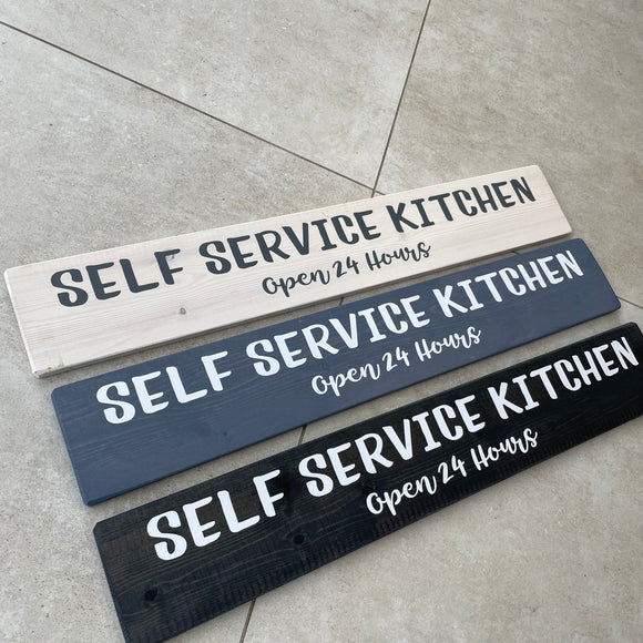 Made in the UK by The Giggle Gift co. Long L59.5cm Wooden Hanging Plaque; Self Service Kitchen Open 24 hours