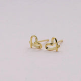 Sweet heart shaped stud earrings presented in a message bottle on a card that reads "you're loved"  Sterling Silver