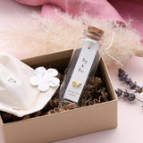 Attic Creations - giftings life's precious moments since 2010;    Message in a Bottle Sterling Silver Earrings handmade in Devon Style - Silver & Rose Gold XO stud earrings Quote on the card - 'Hugs & Kiss'