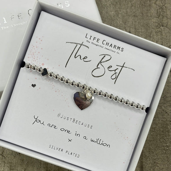 Life charms silver plated bracelet with dangly flat heart & small pearl charm - reads 