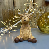 Sitting Harry Highland Cow Figure