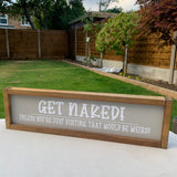 Made in the UK by Giggle Gift co. Rectangular L64cm Framed Plaque with Grey vinyl; "GET NAKED! Unless you are just visiting.  That would be weird!"